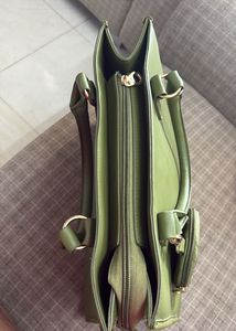 Stylish Green Tote Bag with Coin Pouch. It also ha