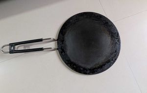 Heavy iron dosa tawa.