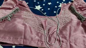 Elegant Pink Saree with Embellished Blouse