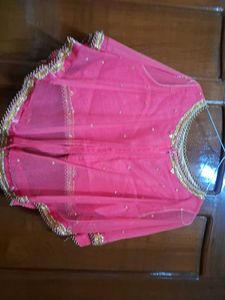 Stunning Pink Embellished Net Blouse