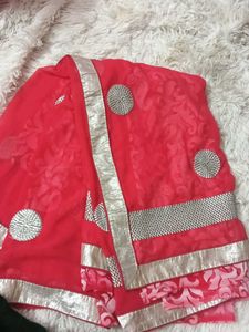 Elegant Red Saree with Embellishments