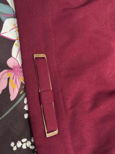 Chic Burgundy Sleeveless Top with Gold Accent