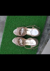 Golden colour beautiful heel