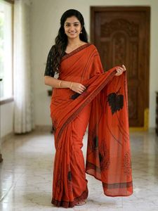 Beautiful Orange Saree with Black Print