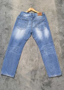 Light Wash Distressed Denim Jeans