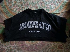Black "UNDFEATED" shrug