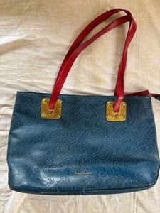 Designer Teal Purse with Red Straps
