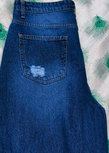 Distressed Blue Denim Jeans