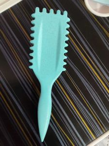 blueish aqua Paddle Hair Brush.