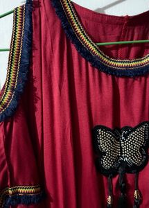 Red Cold Shoulder Top with Butterfly Embellishment