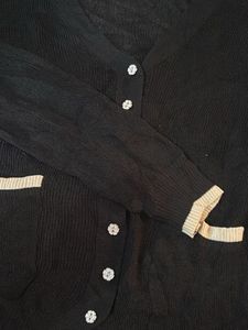 Chic Black Cardigan with Cream Accents