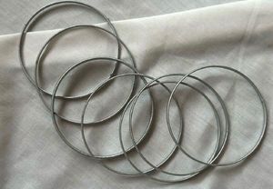 Elegant Silver Tone Bangle Set 🦢