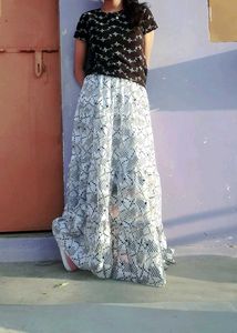 Long white skirt with black Polka dot