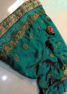 Exquisite Teal Embroidered Saree