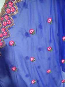 Blue Saree With Flowers Design