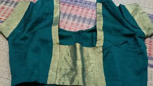 Elegant Teal Saree with Gold Border