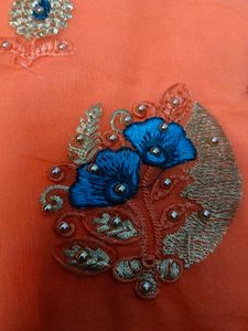 Elegant Orange Embroidered Saree