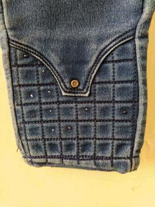 High Waisted Blue Jeans with Embellished Cuffs