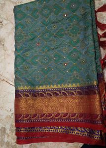 Exquisite Teal Saree with Red Blouse
