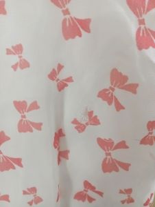 Sleevless White Dress With Red Bows