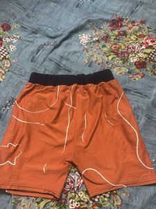 Trendy Orange Abstract Print Shorts