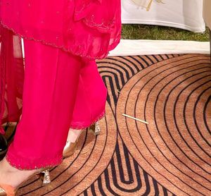 reduced price hot pink suit with handwork done