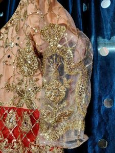 bridal gown peach and red colour