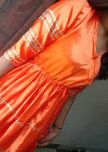 Vibrant Orange Kurta Set with Golden Accents