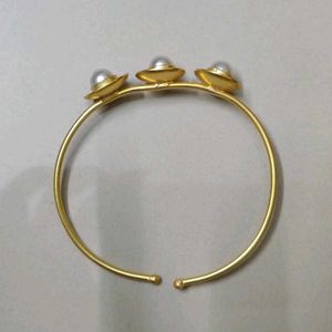 Elegant Gold Bangle with Pearl Accents