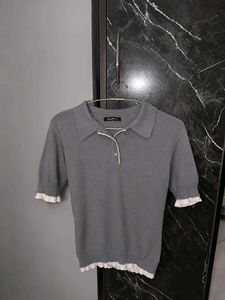 Stylish Grey Polo Neck Top with Ruffle Details
