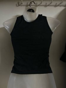 Chic Black Halter Neck Top with Gold Detail