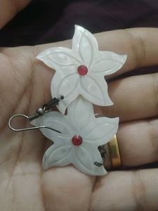 White Flower Earrings with Red Gem