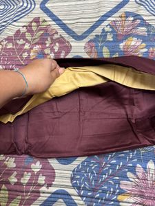 brown unstitched suit