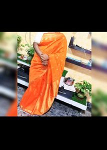 Vibrant Orange Saree with Golden Border