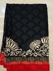 Elegant Black Saree with Floral Border