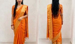 Vibrant Orange Silk Saree with Gold Border