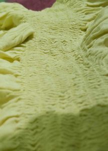 Embroidered light yellow top