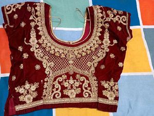 Stunning Red &amp; Gold Embellished Lehenga Choli
