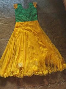 Yellow Net Gown with Green Floral Bodice