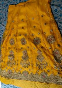 Embroidered Yellow Rajasthani poshak.