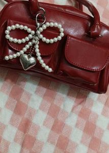Red Handbag with Pearl Detail