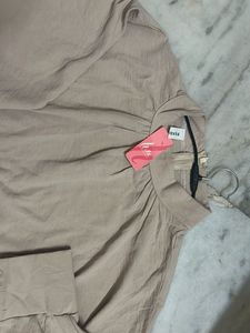 Elegant Beige Top with Button Cuffs