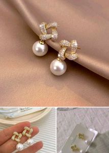 Elegant Pearl & Crystal Stud Earrings
