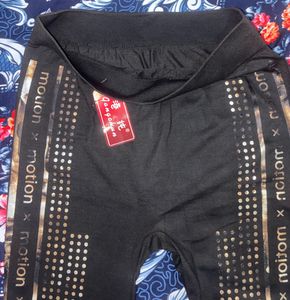 Stylish Black Jagging with Gold Embellishments