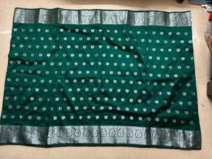 Elegant Emerald Green Saree with Silver Motifs