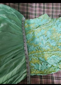 Elegant Green Maxi Dress with Floral Detail