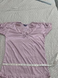 sleep dress in silk cloth with cute lace border .