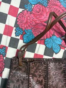 Elegant Embossed Floral Handbag