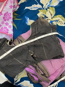 Elegant lavender and black Saree with Gold Border