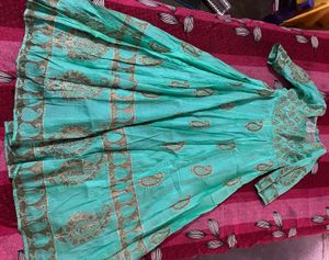 Beautiful Teal Ethnic Gown with Gold Print know an